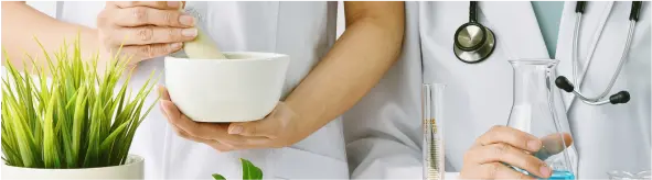 image of a doctor holding a herbal cup and a stethoscope, symbolizing integrative medicine
